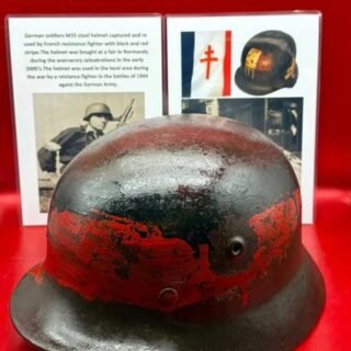 Fantastic condition,complete and totally rare German soldiers M35 steel helmet captured and re used by French resistance fighter with black and red stripe it was bought at a fair in Normandy during the anerversry celeabrations in the early 2000’s,
