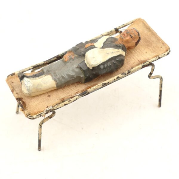 German Schusso Wounded Soldier on Stretcher